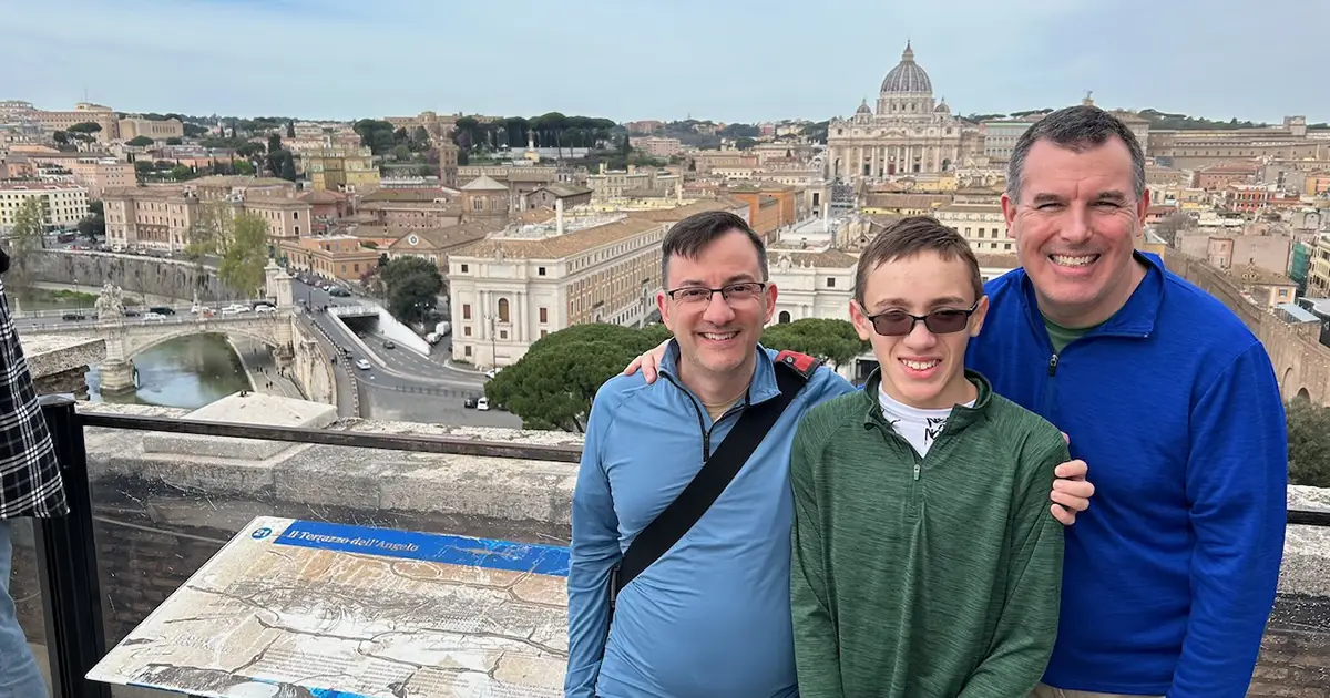 Traveling to Italy with kids offers incredible family moments, like this view over the Vatican from atop Castel Sant'Angelo in Rome.